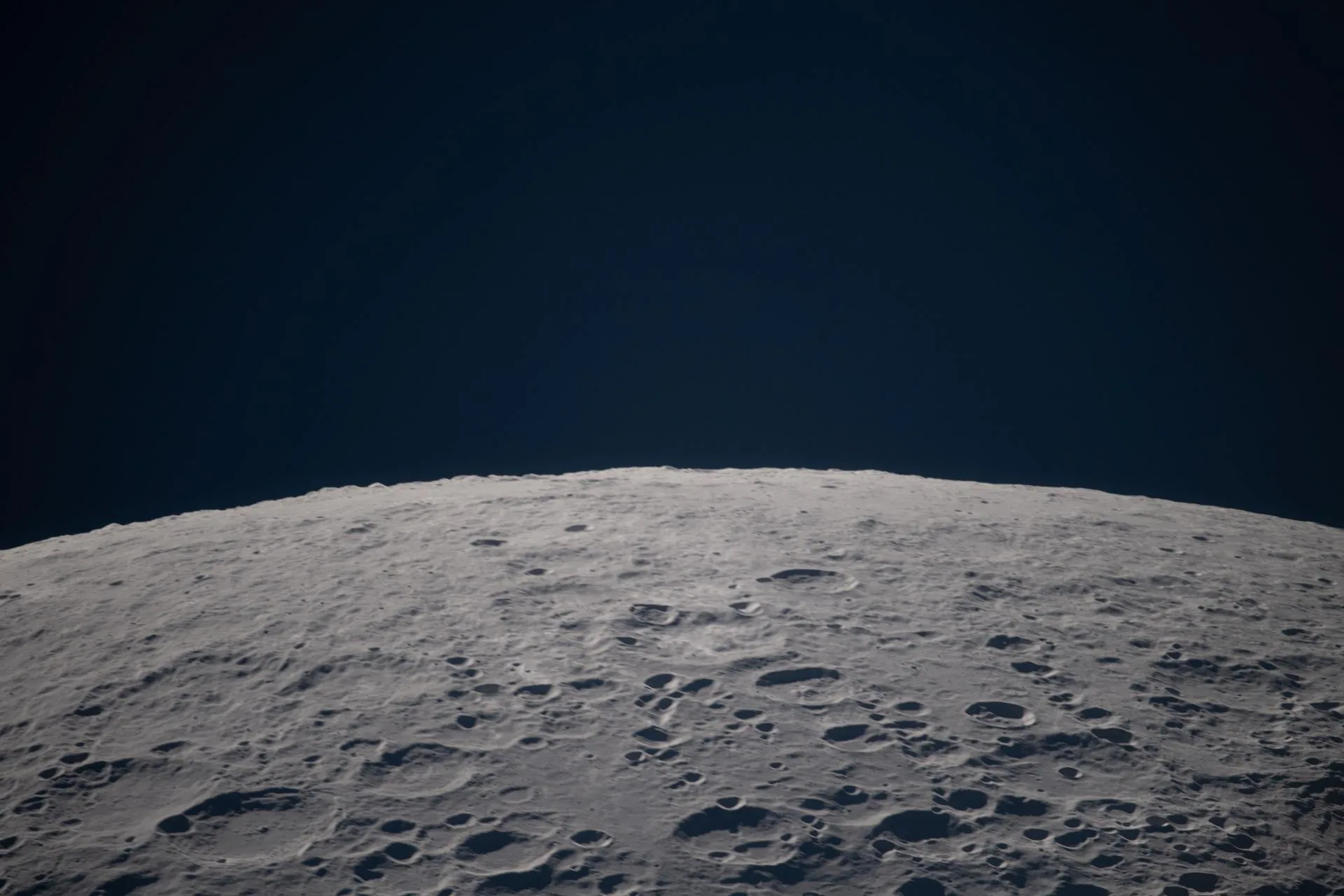 Artemis II Crew Captures Moon’s Far Side During Flyby